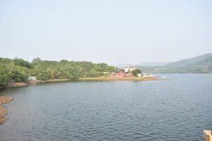 Peaceful view of Shivaji Lake in Lonavala surrounded by greenery